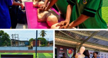 Young athletes practicing CPR chest compressions during JNHF and NAFA training